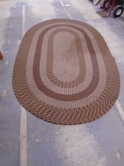 Large Brown Braided Oval Rug