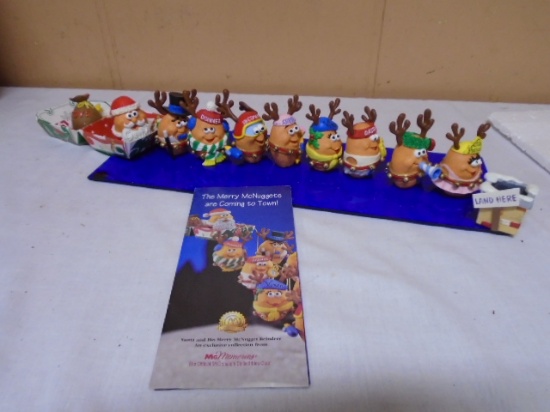 The Merry McNuggets Sant and His Reindeer 12 Pc. Display