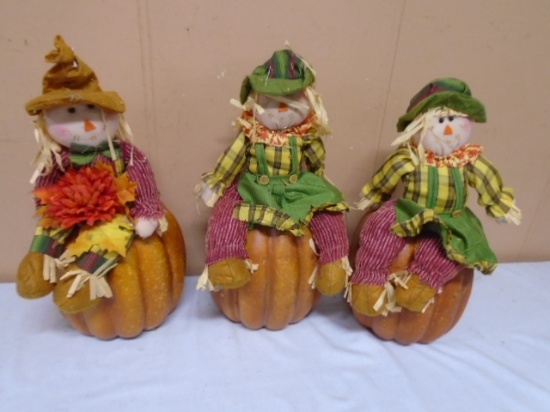 Group of 3 Decorative Garden Scarecrows on Pumpkin Décor Pieces