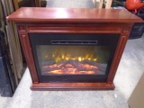 Heat Surge Wood Case Rolling Electric Fireplace w/ Heat