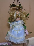 Ashley Belle Porcelain Doll on Swing
