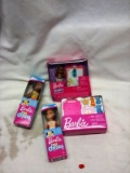 Four Packages of Barbie Chelsea Toys