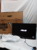 Asus Gaming monitor with swivel stand 24in plugged in turns on