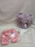 2 Pairs of Large Stars Above Fluffy House Slippers Valued Over $20 One Purple and One Pink