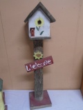 Decorative Wooden Bird House on Post