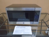 Like New GE Stainless Steel Front Microwave w/ Manual