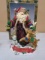 Seasons Greeting Holiday Santa Statue
