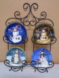 4pc Group of Decorative Snowman Plates in Iron Wall Rack