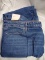 A. New Day Tapered Leg High Rise Relaxed Fit Jeans Size: 26W/R