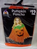 Pumpkin poncho fits most adults