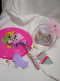 assorted items as pictured, frisbee, fidget keychains, headband, pen, bag