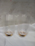 Pair of Glass Drinking Glasses w/ Gold Trim on Bottom.