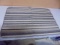 Like New Gray Striped Rubber Back Rug