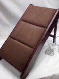 Brown pet ramp, appears used, fabric has 2 mall cuts with foam showing