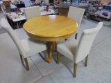Solid Oak Pedistal Dining Table w/ Butterfly Leaf & 4 Upholstered Chairs