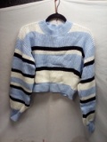 QTY 1 Sweater, size medium