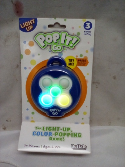 Pop It Go! Light Up Color Popping Game.