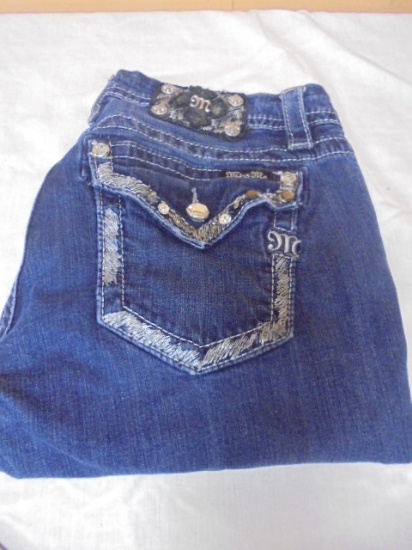 Pair of Ladies Miss Me Mid Rise Easy Cropped Jeans