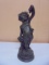 Bronze Sculpture of a Cherub Holding Grapes
