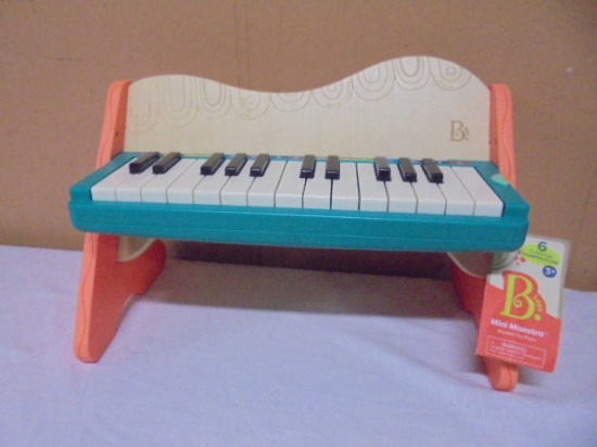B. Toys Mini Maestro Woode Toy Piano