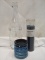 Candle with blue glass décor and clear  decorative bottle