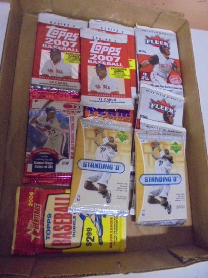 12 Unopened Packs of Sports Cards