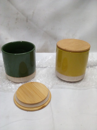 Pair of 4.5”Tx4”D Assorted Ceramic Canisters w/ Wooden Lids