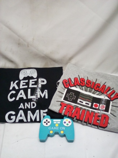 2 xl shirts and game on sign