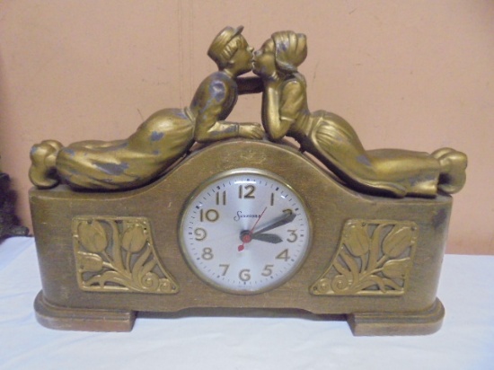 Vintage Metal Sessions Electric Clock w/ Kissing Dutch Boy & Girl