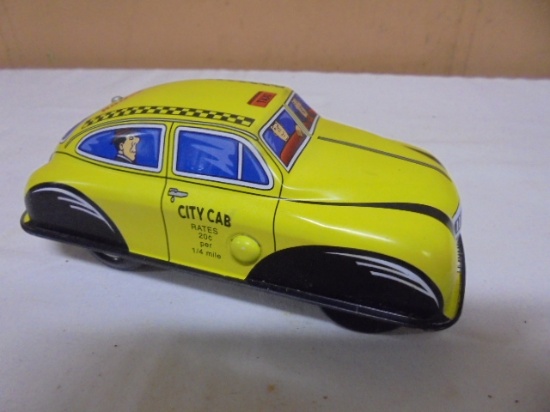 City Cab Tin Type Push Down Car