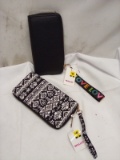 Pair of Assorted Print Wrislet Size Wallets