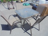 Glass Top Patio Table w/ 4 Matching Chairs
