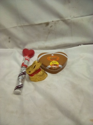 Reese’s Peanut Butter Tin , Kisses Cane, Lindt Chocolate Bunny ( BB Date 7/26)