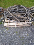Skid lot of various hoses with fittings