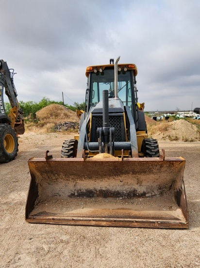 2007 John Deere 410J Backhoe Loader W/ 1.5 cu/yd Bucket & W/ Self Aligning Rolle