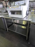 Eagle 48 in. X 30 in. All Stainless Table with 4 in. Backsplash