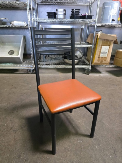 Black Metal Frame Ladderback Chairs with Burnt Orange Seat Cushions