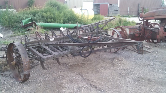 Antique Chisel Plow on Steel Wheels