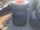 (4) 10/16.5 NEW SKID STEER TIRES AND WHEELS