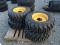 (4) NEW 12-16.5 SKID STEER TIRES AND WHEELS