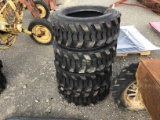 (4) NEW 10-16.5 SKID STEER TIRES