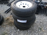 (4) NEW ST205/75R15 TRAILER TIRES AND WHEELS