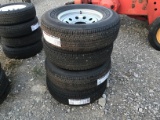 (4) NEW ST235/75R15 TRAILER TIRES AND WHEELS