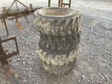 (4) 10-16.5 SKID STEER TIRES AND RIMS