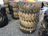 (4) NEW 12-16.5 BOBCAT SKID STEER TIRES AND RIMS