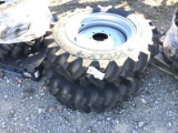 (2) NEW 9.5 X 20 TITAN TRACTOR TIRES AND RIMS