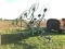 702 JOHN DEERE 10 WHEEL V-RAKE W/ KICKER