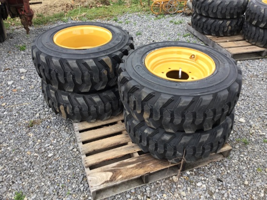 (4) NEW 12-16.5 SKID STEER TIRES AND WHEELS - ALL ONE PRICE