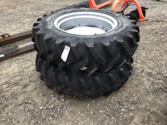 (2) NEW 13.6/28 TITAN TRACTOR TIRES AND WHEELS