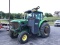 6615 JOHN DEERE TRACTOR W/ CAB AND SIDE BOOM MOWER